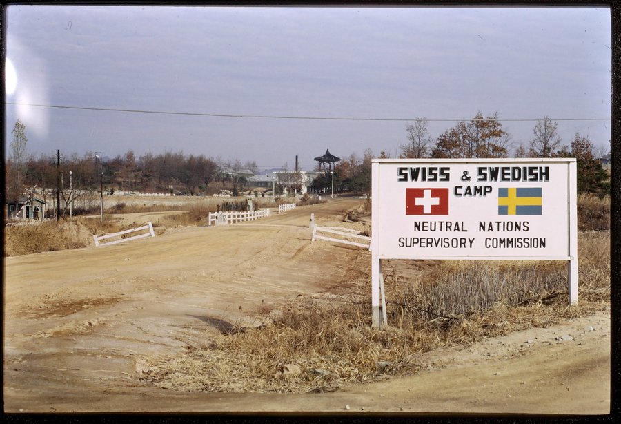 Signposts to the NNSC Camp in 1964. The Swedish and Swiss Delegations to the NNSC were and still are based on the southern side of the Military Demarcation Line.