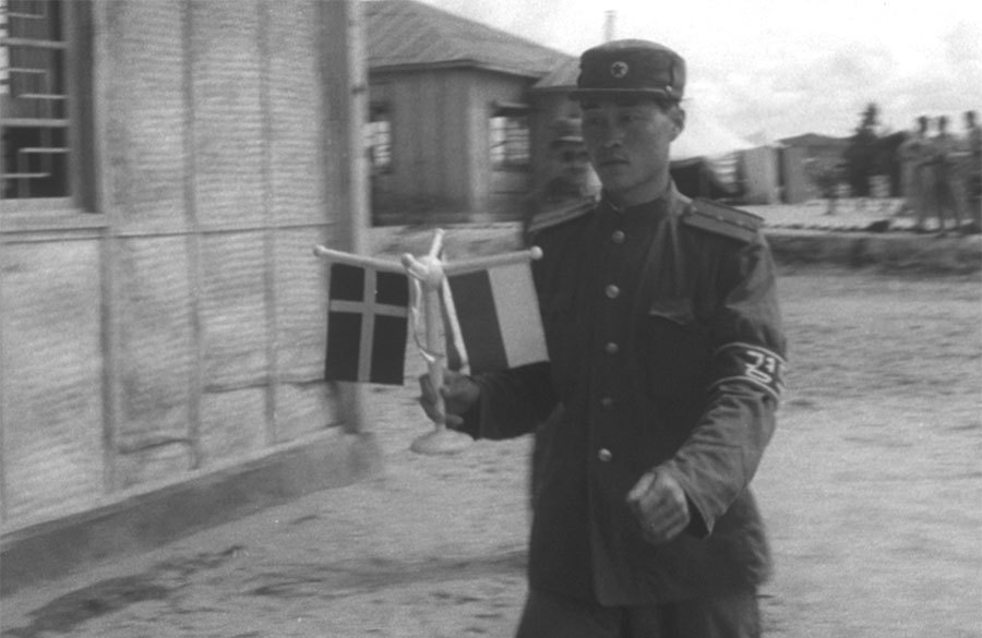 NNSC delegations entering conference row in the Joint Security Area for their daily meeting in the early 1950s
